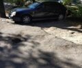 Чорний Шевроле Еванда, об'ємом двигуна 2 л та пробігом 300 тис. км за 3199 $, фото 1 на Automoto.ua