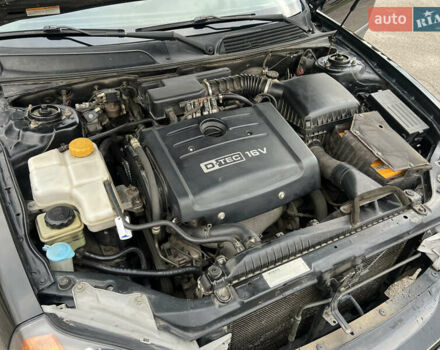 Черный Шевроле Эванда, объемом двигателя 2 л и пробегом 193 тыс. км за 4200 $, фото 28 на Automoto.ua
