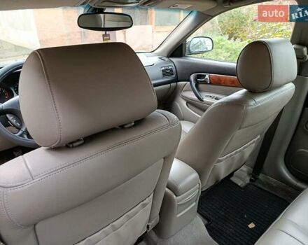 Черный Шевроле Эванда, объемом двигателя 2 л и пробегом 207 тыс. км за 4436 $, фото 7 на Automoto.ua