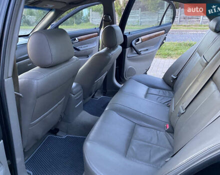 Черный Шевроле Эванда, объемом двигателя 2 л и пробегом 256 тыс. км за 4199 $, фото 9 на Automoto.ua