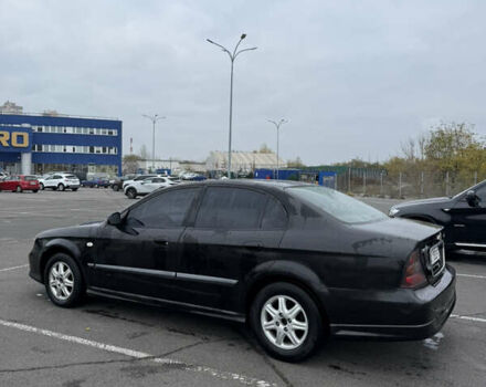 Чорний Шевроле Еванда, об'ємом двигуна 2 л та пробігом 299 тис. км за 3500 $, фото 11 на Automoto.ua