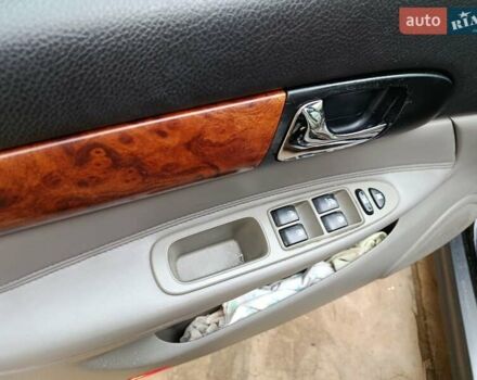 Черный Шевроле Эванда, объемом двигателя 2 л и пробегом 207 тыс. км за 4436 $, фото 8 на Automoto.ua