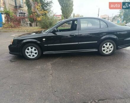 Чорний Шевроле Еванда, об'ємом двигуна 2 л та пробігом 355 тис. км за 3500 $, фото 8 на Automoto.ua