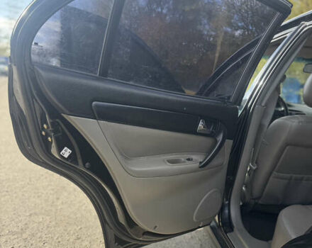 Черный Шевроле Эванда, объемом двигателя 2 л и пробегом 320 тыс. км за 3200 $, фото 12 на Automoto.ua