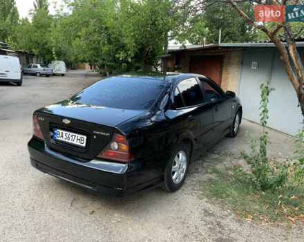 Черный Шевроле Эванда, объемом двигателя 2.5 л и пробегом 187 тыс. км за 4700 $, фото 1 на Automoto.ua