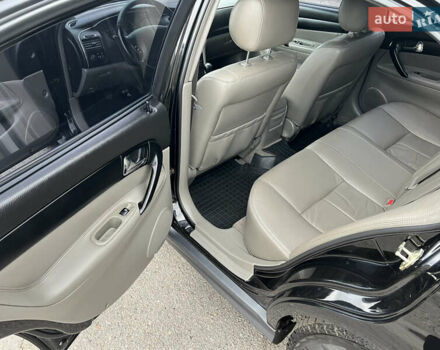 Черный Шевроле Эванда, объемом двигателя 2 л и пробегом 193 тыс. км за 4200 $, фото 11 на Automoto.ua