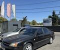 Чорний Шевроле Еванда, об'ємом двигуна 2 л та пробігом 290 тис. км за 3800 $, фото 1 на Automoto.ua