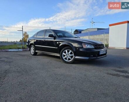 Чорний Шевроле Еванда, об'ємом двигуна 2 л та пробігом 290 тис. км за 2850 $, фото 3 на Automoto.ua