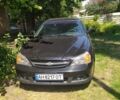 Чорний Шевроле Еванда, об'ємом двигуна 2 л та пробігом 170 тис. км за 4600 $, фото 1 на Automoto.ua