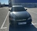 Чорний Шевроле Еванда, об'ємом двигуна 2 л та пробігом 300 тис. км за 2850 $, фото 1 на Automoto.ua