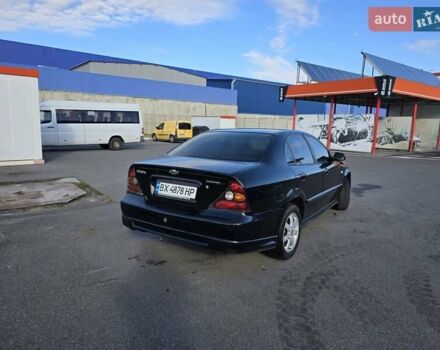 Чорний Шевроле Еванда, об'ємом двигуна 2 л та пробігом 290 тис. км за 2850 $, фото 5 на Automoto.ua