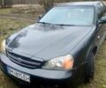Черный Шевроле Эванда, объемом двигателя 2 л и пробегом 330 тыс. км за 2500 $, фото 1 на Automoto.ua