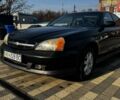 Чорний Шевроле Еванда, об'ємом двигуна 2 л та пробігом 253 тис. км за 2700 $, фото 1 на Automoto.ua