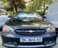 Чорний Шевроле Еванда, об'ємом двигуна 2 л та пробігом 230 тис. км за 3600 $, фото 1 на Automoto.ua