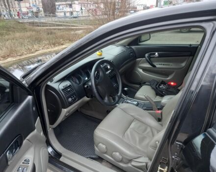 Черный Шевроле Эванда, объемом двигателя 2 л и пробегом 198 тыс. км за 4500 $, фото 4 на Automoto.ua