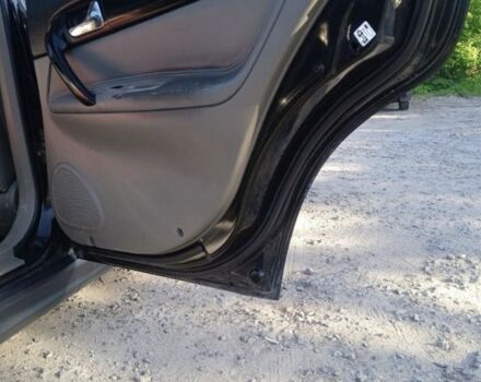 Чорний Шевроле Еванда, об'ємом двигуна 2 л та пробігом 160 тис. км за 2499 $, фото 7 на Automoto.ua