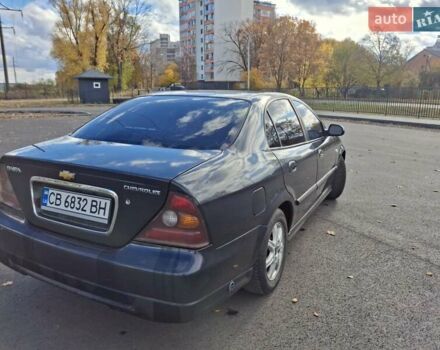 Чорний Шевроле Еванда, об'ємом двигуна 2 л та пробігом 280 тис. км за 3899 $, фото 3 на Automoto.ua