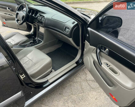 Черный Шевроле Эванда, объемом двигателя 2 л и пробегом 193 тыс. км за 4200 $, фото 14 на Automoto.ua