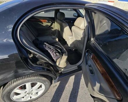 Чорний Шевроле Еванда, об'ємом двигуна 2 л та пробігом 290 тис. км за 2850 $, фото 19 на Automoto.ua