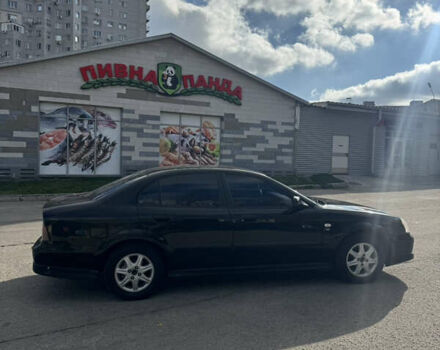 Черный Шевроле Эванда, объемом двигателя 2 л и пробегом 320 тыс. км за 3200 $, фото 7 на Automoto.ua