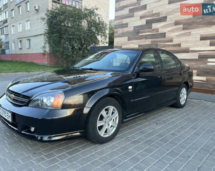 Черный Шевроле Эванда, объемом двигателя 2 л и пробегом 256 тыс. км за 4199 $, фото 5 на Automoto.ua