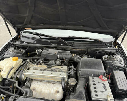 Чорний Шевроле Еванда, об'ємом двигуна 2 л та пробігом 299 тис. км за 3500 $, фото 10 на Automoto.ua