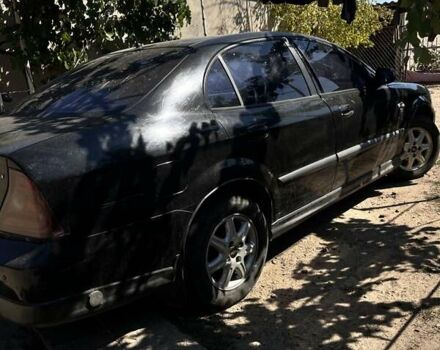Чорний Шевроле Еванда, об'ємом двигуна 2 л та пробігом 150 тис. км за 3800 $, фото 2 на Automoto.ua