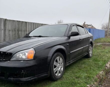 Черный Шевроле Эванда, объемом двигателя 2 л и пробегом 3 тыс. км за 2200 $, фото 4 на Automoto.ua