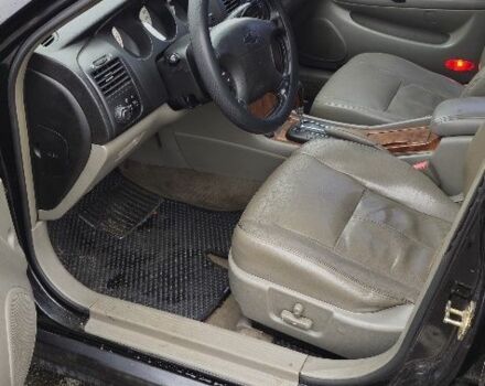 Черный Шевроле Эванда, объемом двигателя 2 л и пробегом 350 тыс. км за 3400 $, фото 4 на Automoto.ua