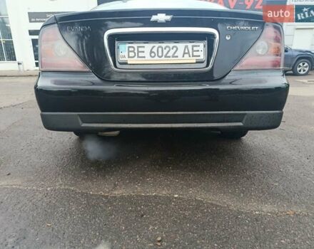 Чорний Шевроле Еванда, об'ємом двигуна 2 л та пробігом 355 тис. км за 3500 $, фото 7 на Automoto.ua