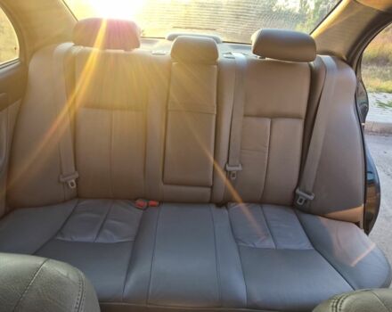 Черный Шевроле Эванда, объемом двигателя 2 л и пробегом 250 тыс. км за 4196 $, фото 9 на Automoto.ua