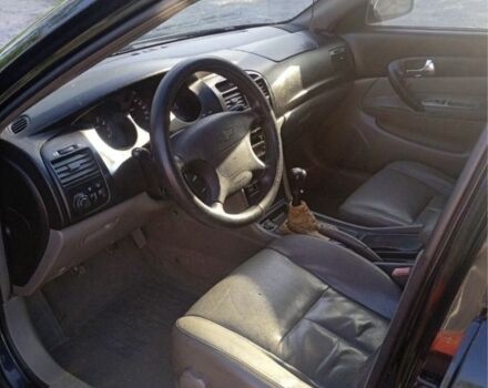 Чорний Шевроле Еванда, об'ємом двигуна 2 л та пробігом 160 тис. км за 2499 $, фото 8 на Automoto.ua