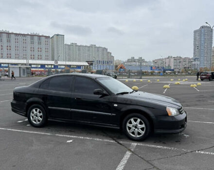 Чорний Шевроле Еванда, об'ємом двигуна 2 л та пробігом 299 тис. км за 3500 $, фото 14 на Automoto.ua