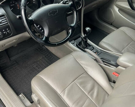 Черный Шевроле Эванда, объемом двигателя 2 л и пробегом 193 тыс. км за 4200 $, фото 10 на Automoto.ua