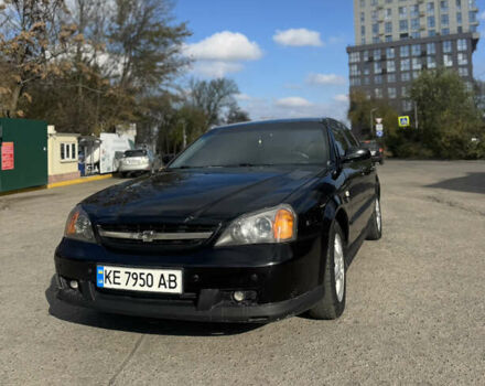 Черный Шевроле Эванда, объемом двигателя 2 л и пробегом 320 тыс. км за 3200 $, фото 2 на Automoto.ua