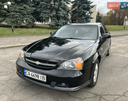 Черный Шевроле Эванда, объемом двигателя 2 л и пробегом 193 тыс. км за 4200 $, фото 1 на Automoto.ua