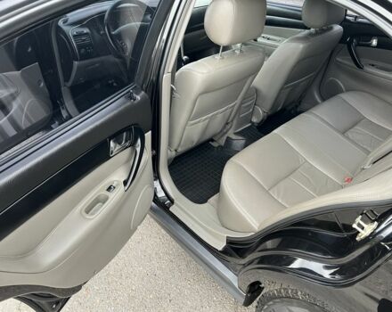 Черный Шевроле Эванда, объемом двигателя 2 л и пробегом 193 тыс. км за 4200 $, фото 10 на Automoto.ua