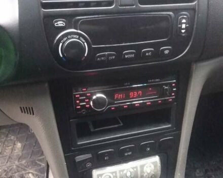 Черный Шевроле Эванда, объемом двигателя 2 л и пробегом 300 тыс. км за 4200 $, фото 5 на Automoto.ua