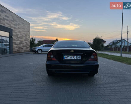 Черный Шевроле Эванда, объемом двигателя 2 л и пробегом 256 тыс. км за 4199 $, фото 2 на Automoto.ua