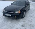 Черный Шевроле Эванда, объемом двигателя 2 л и пробегом 92 тыс. км за 6000 $, фото 1 на Automoto.ua