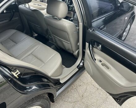 Черный Шевроле Эванда, объемом двигателя 2 л и пробегом 193 тыс. км за 4200 $, фото 11 на Automoto.ua