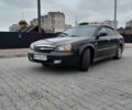 Чорний Шевроле Еванда, об'ємом двигуна 2 л та пробігом 160 тис. км за 4900 $, фото 1 на Automoto.ua