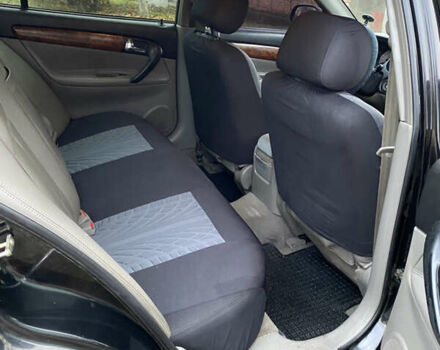 Чорний Шевроле Еванда, об'ємом двигуна 2 л та пробігом 181 тис. км за 5000 $, фото 11 на Automoto.ua