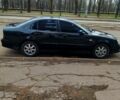 Чорний Шевроле Еванда, об'ємом двигуна 2 л та пробігом 270 тис. км за 3500 $, фото 1 на Automoto.ua