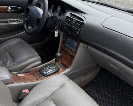 Чорний Шевроле Еванда, об'ємом двигуна 2 л та пробігом 299 тис. км за 3500 $, фото 8 на Automoto.ua