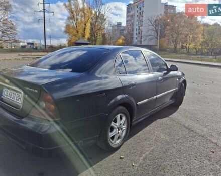 Чорний Шевроле Еванда, об'ємом двигуна 2 л та пробігом 280 тис. км за 3899 $, фото 7 на Automoto.ua