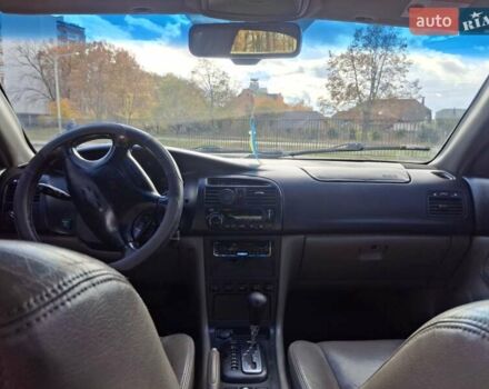 Чорний Шевроле Еванда, об'ємом двигуна 2 л та пробігом 280 тис. км за 3899 $, фото 5 на Automoto.ua