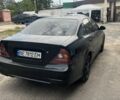 Черный Шевроле Эванда, объемом двигателя 2 л и пробегом 200 тыс. км за 3100 $, фото 2 на Automoto.ua