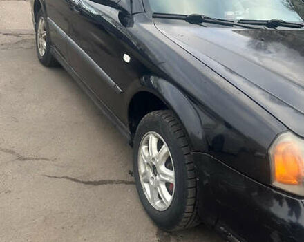 Чорний Шевроле Еванда, об'ємом двигуна 2 л та пробігом 266 тис. км за 3000 $, фото 2 на Automoto.ua