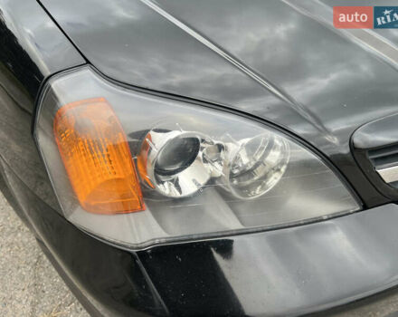 Черный Шевроле Эванда, объемом двигателя 2 л и пробегом 193 тыс. км за 4200 $, фото 32 на Automoto.ua